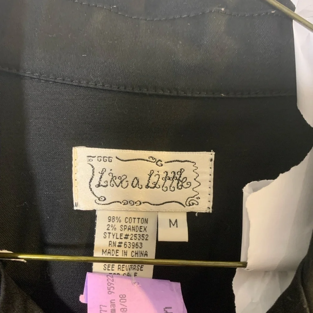 Black jean jacket.  Waist length.  Slight stretch in fabric.  dry cleaned. - Picture 2 of 4